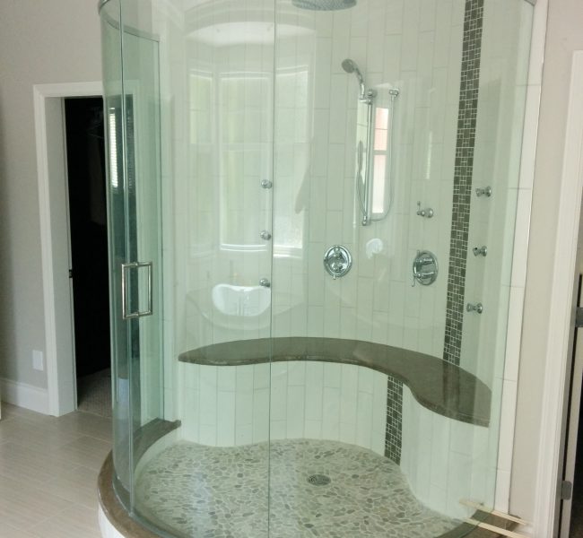 Curved shower with top cap